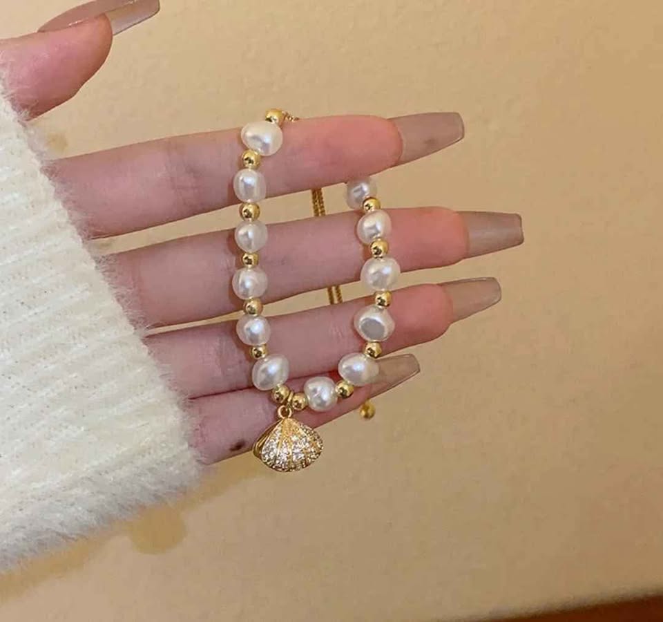 Elegant Pearl & Charm Bracelet- Gold tone