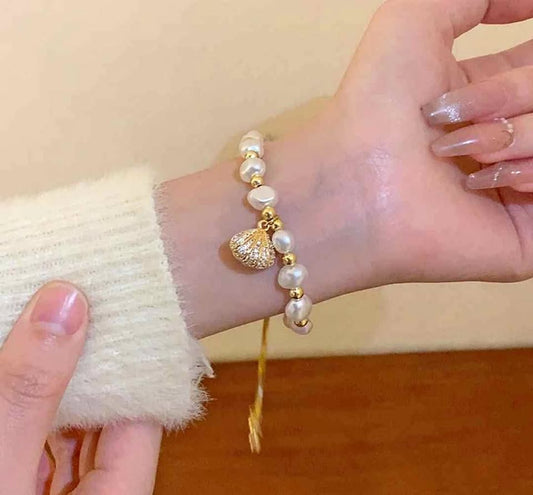 Elegant Pearl & Charm Bracelet- Gold tone